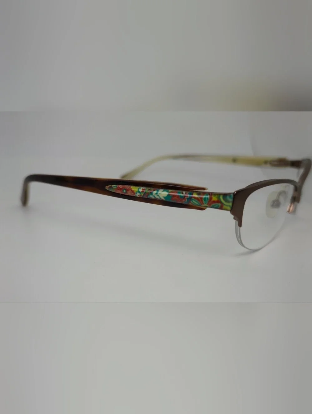 Lola. Vera Bradley Women's Semi-Rimless Glasses in Brown Matte. Small.